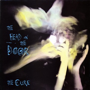 Cure (The) - The Head On The Door